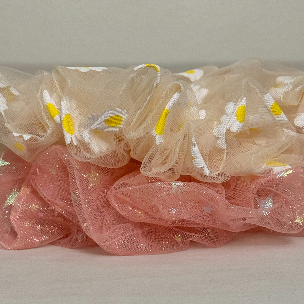 Sheer fabric with florals on a light gray background