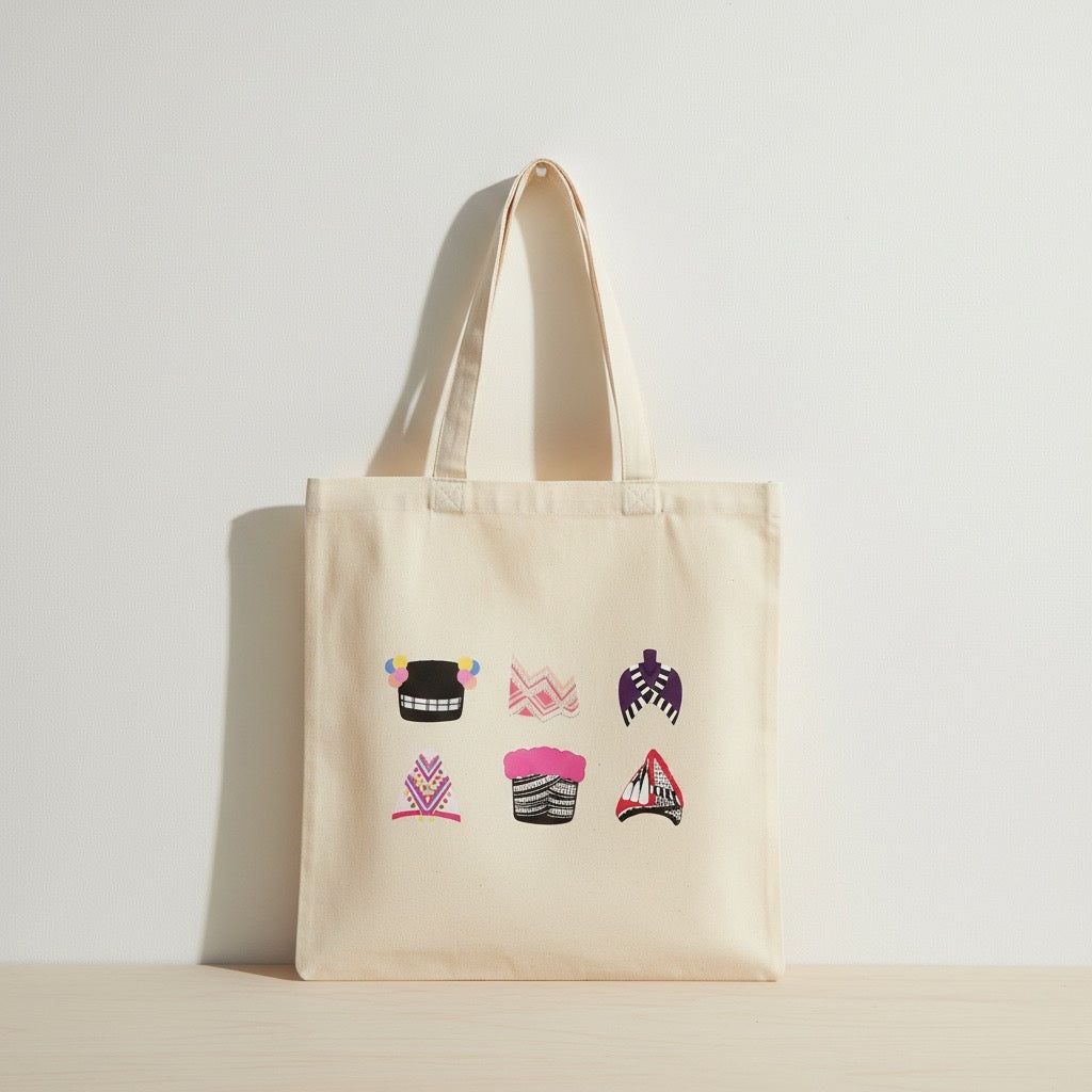 Beige tote bag with Hmong hats designs on a light gray background