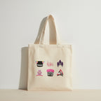 Beige tote bag with Hmong hats designs on a light gray background